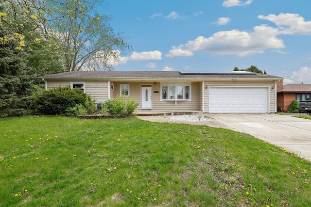 1018 Stonegate Rd, New Lenox, IL 60451 - single story home with roof mounted solar panels, an attached garage, concrete driveway, and a front lawn