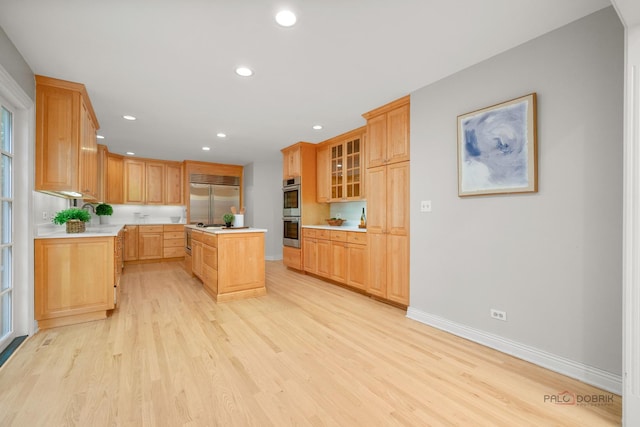 590 Academy Woods Dr, Lake Forest, IL 60045 - kitchen with appliances with stainless steel finishes, light countertops, light wood-style flooring, and recessed lighting