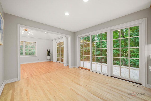 590 Academy Woods Dr, Lake Forest, IL 60045 - empty room with wood finished floors and recessed lighting