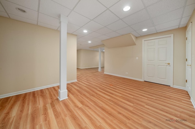 590 Academy Woods Dr, Lake Forest, IL 60045 - finished below grade area with a drop ceiling, light wood-style flooring, and recessed lighting