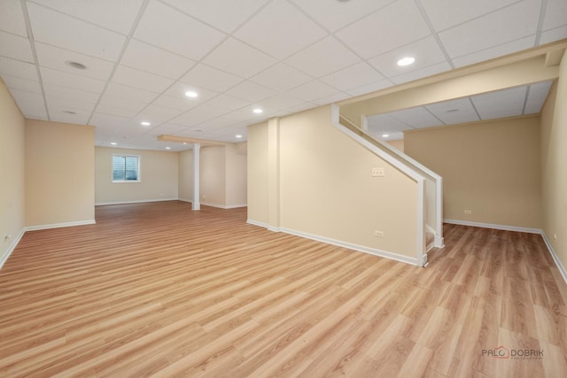 590 Academy Woods Dr, Lake Forest, IL 60045 - below grade area featuring a paneled ceiling, light wood-type flooring, stairs, and recessed lighting