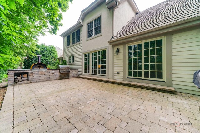 590 Academy Woods Dr, Lake Forest, IL 60045 - view of patio / terrace featuring an outdoor kitchen
