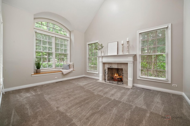 590 Academy Woods Dr, Lake Forest, IL 60045 - unfurnished living room featuring a fireplace, vaulted ceiling, and carpet flooring