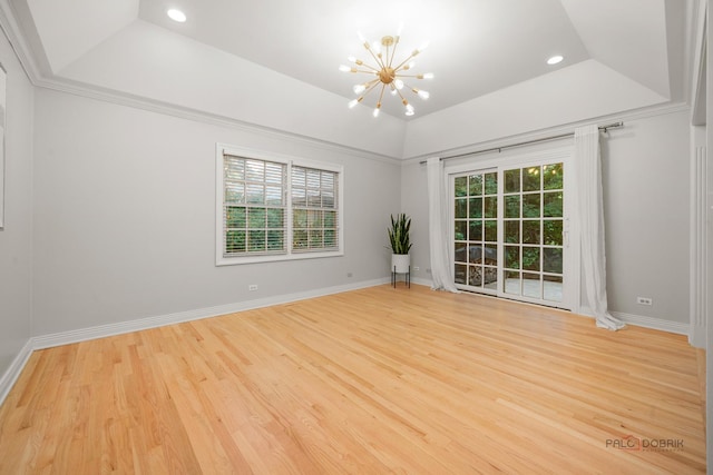 590 Academy Woods Dr, Lake Forest, IL 60045 - spare room with a chandelier, a tray ceiling, light wood-type flooring, and recessed lighting