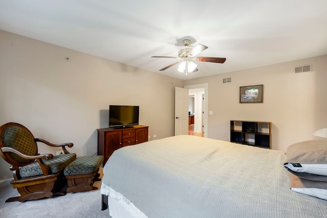 carpeted bedroom featuring a ceiling fan
