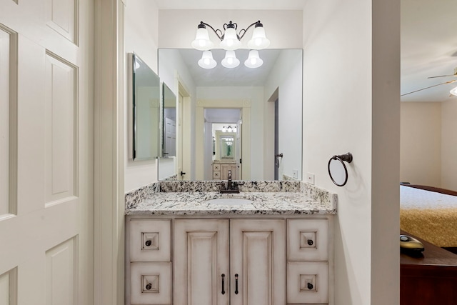 bathroom featuring vanity and a ceiling fan