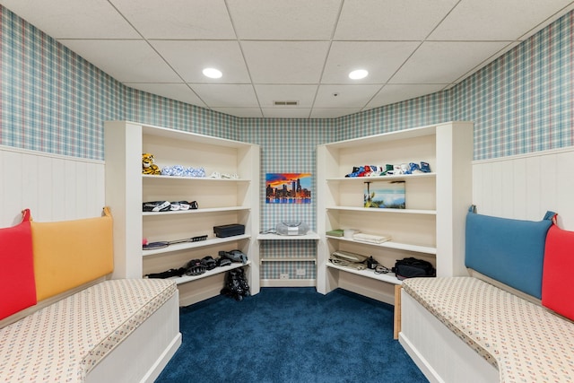 mudroom featuring wainscoting, wallpapered walls, dark carpet, and recessed lighting