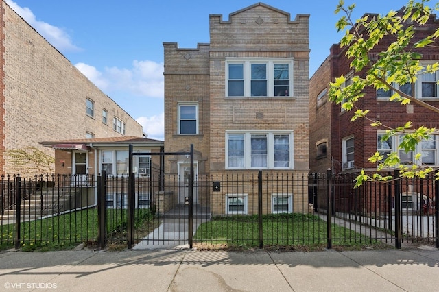 view of front property with brick siding, a gate, a fenced front yard, and stone siding