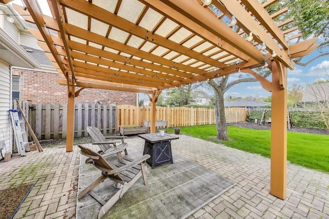 view of patio with a fire pit and a pergola