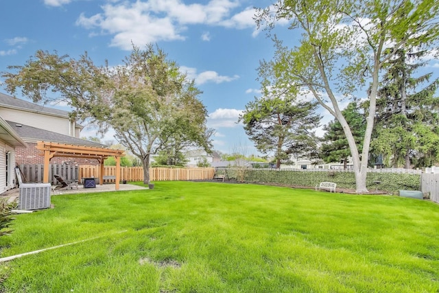 view of yard with cooling unit, a patio area, and a gazebo