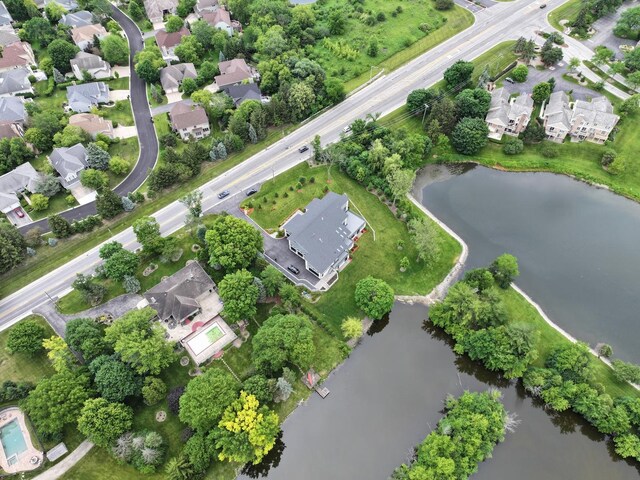 aerial view with a water view and a residential view