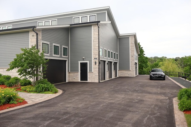 view of front of house with stone siding