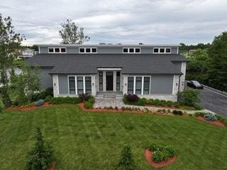 view of front of house with a front lawn