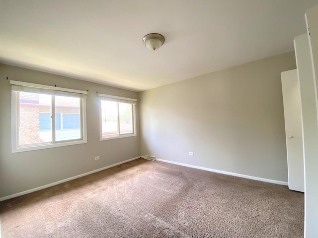 5210 Arquilla Dr, Richton Park, IL 60471 - carpeted spare room featuring baseboards