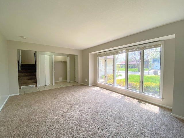 5210 Arquilla Dr, Richton Park, IL 60471 - interior space featuring visible vents, stairs, carpet, and baseboards