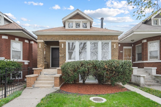 8543 S Laflin St, Chicago, IL 60620 - bungalow-style home with brick siding and fence