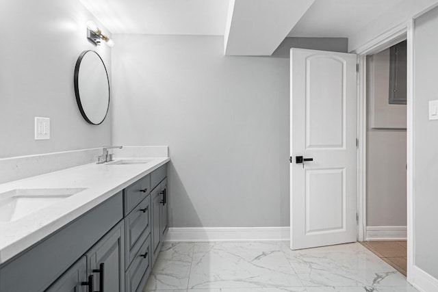 8543 S Laflin St, Chicago, IL 60620 - bathroom featuring a sink, baseboards, double vanity, and marble finish floor
