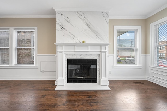 8543 S Laflin St, Chicago, IL 60620 - unfurnished living room with visible vents, ornamental molding, dark wood finished floors, and a high end fireplace