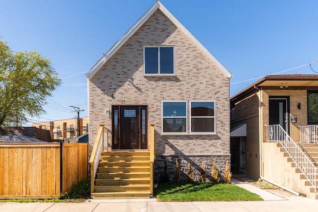 4134 W Roscoe St, Chicago, IL 60641 - view of front of house featuring brick siding and fence