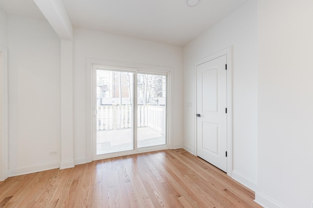 4134 W Roscoe St, Chicago, IL 60641 - spare room featuring light wood-type flooring and baseboards