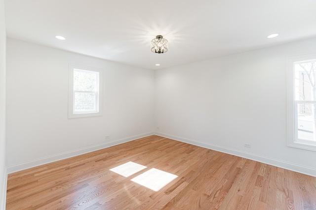 4134 W Roscoe St, Chicago, IL 60641 - unfurnished room with light wood-type flooring, baseboards, and recessed lighting