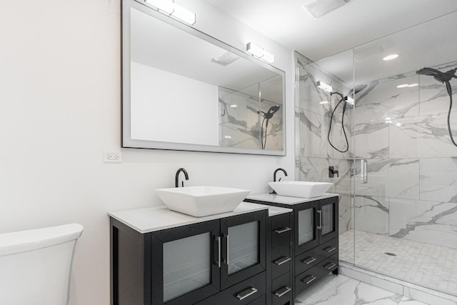 4134 W Roscoe St, Chicago, IL 60641 - bathroom featuring marble look tiles, a marble finish shower, double vanity, toilet, and recessed lighting