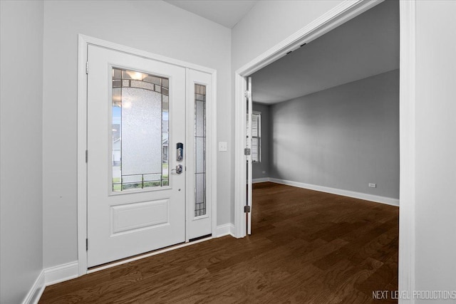 719 Foxborough Rd, South Elgin, IL 60177 - foyer featuring dark wood-type flooring and baseboards