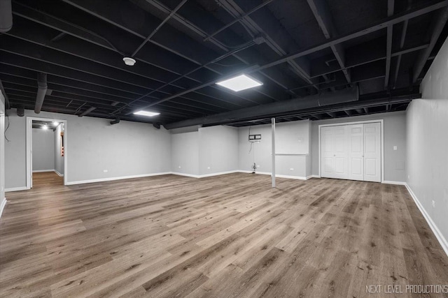 719 Foxborough Rd, South Elgin, IL 60177 - finished below grade area with baseboards and wood finished floors