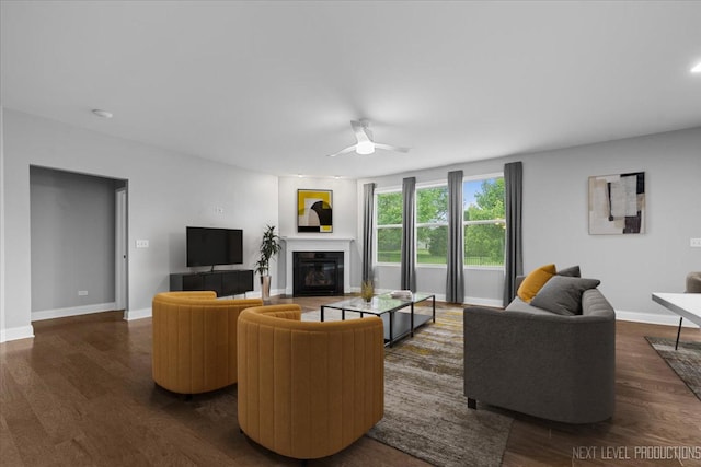 719 Foxborough Rd, South Elgin, IL 60177 - living area featuring a ceiling fan, a glass covered fireplace, dark wood-style flooring, baseboards, and recessed lighting