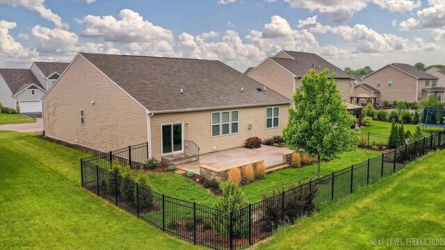 719 Foxborough Rd, South Elgin, IL 60177 - back of property with a patio and roof with shingles