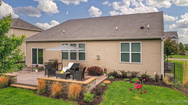 719 Foxborough Rd, South Elgin, IL 60177 - back of house with a patio, an outdoor living space, and a shingled roof