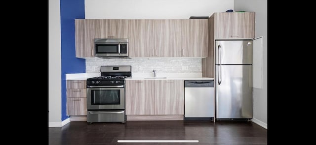 1345 S Wabash Ave Unit 502, Chicago, IL 60605 - kitchen featuring stainless steel appliances, modern cabinets, a sink, and light countertops