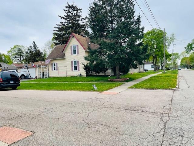 242 N Grove St, Carpentersville, IL 60110 - exterior space featuring a front yard