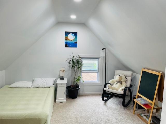 242 N Grove St, Carpentersville, IL 60110 - bedroom featuring light carpet and lofted ceiling