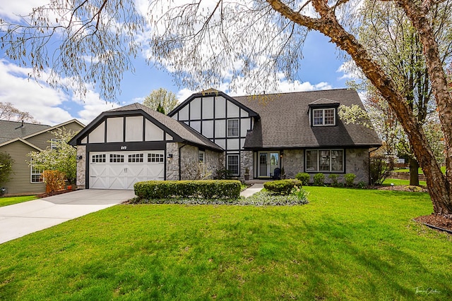 849 Brompton Cir, Bolingbrook, IL 60440 - tudor house featuring stone siding, a garage, a front yard, and driveway