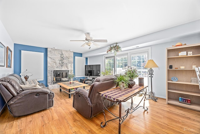 849 Brompton Cir, Bolingbrook, IL 60440 - living room with light wood-style floors, a ceiling fan, and a high end fireplace
