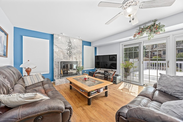 849 Brompton Cir, Bolingbrook, IL 60440 - living room with plenty of natural light, wood finished floors, ceiling fan, and a premium fireplace
