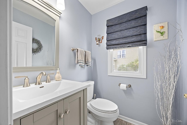 849 Brompton Cir, Bolingbrook, IL 60440 - half bath featuring vanity, toilet, and baseboards