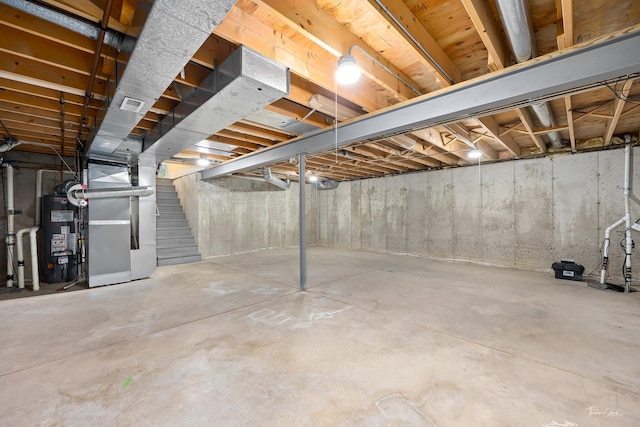 849 Brompton Cir, Bolingbrook, IL 60440 - unfinished basement with gas water heater, stairway, and heating unit