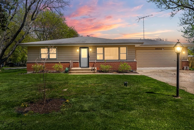 16121 S Harmony Dr, Plainfield, IL 60586 - view of front of property with brick siding, a garage, driveway, and a front yard