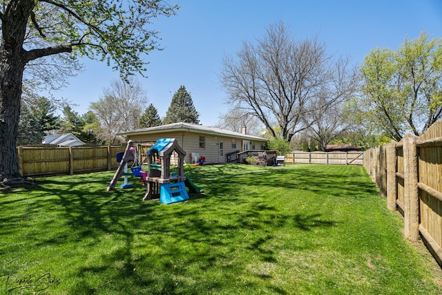 16121 S Harmony Dr, Plainfield, IL 60586 - view of yard featuring a fenced backyard and a playground