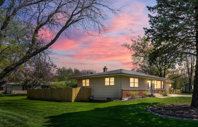 16121 S Harmony Dr, Plainfield, IL 60586 - exterior space featuring a lawn, fence, a chimney, and brick siding