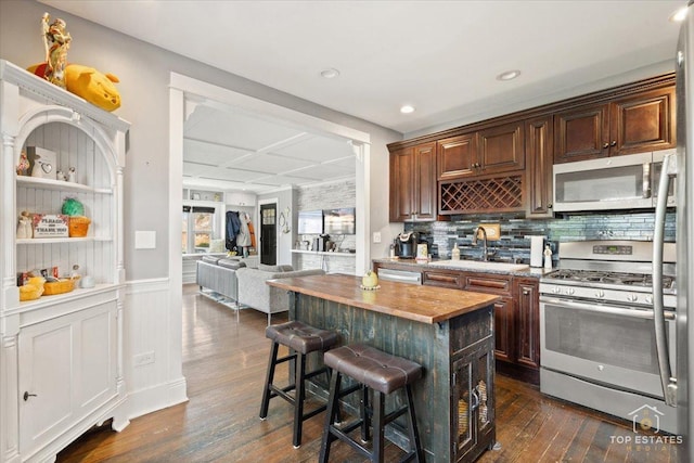 309 E Elm St, Villa Park, IL 60181 - kitchen with a sink, appliances with stainless steel finishes, dark wood-style flooring, and butcher block countertops