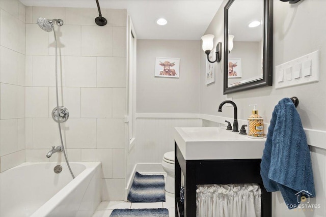 309 E Elm St, Villa Park, IL 60181 - full bathroom with wainscoting, vanity, bathtub / shower combination, toilet, and tile patterned floors