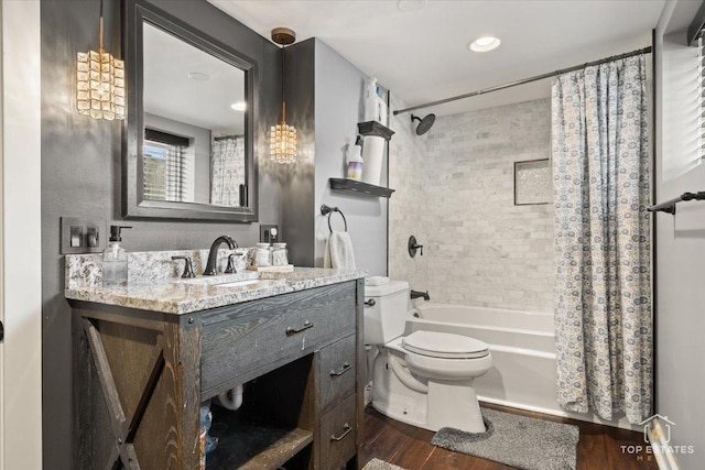 309 E Elm St, Villa Park, IL 60181 - full bathroom featuring toilet, shower / bathtub combination with curtain, wood finished floors, and vanity