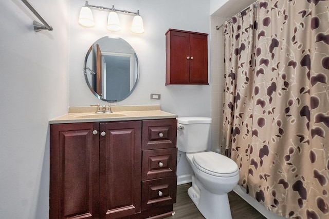 7330 Fairview Ave Unit 104, Downers Grove, IL 60516 - bathroom featuring toilet, a shower with curtain, wood finished floors, and vanity