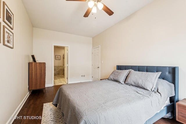 521 N Racine Ave Unit 3, Chicago, IL 60642 - bedroom featuring dark wood-style flooring, baseboards, ensuite bath, and ceiling fan