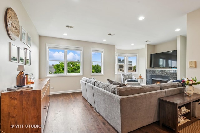 521 N Racine Ave Unit 3, Chicago, IL 60642 - living area featuring dark wood-style floors, a fireplace, baseboards, and recessed lighting