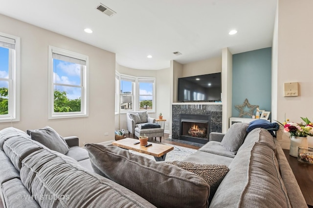 521 N Racine Ave Unit 3, Chicago, IL 60642 - living area with a high end fireplace, recessed lighting, and baseboards