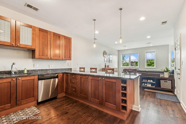 521 N Racine Ave Unit 3, Chicago, IL 60642 - kitchen with dishwasher, a sink, dark wood-type flooring, a peninsula, and dark stone counters